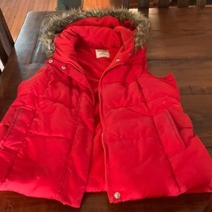 Red winter vest. No rips or tears